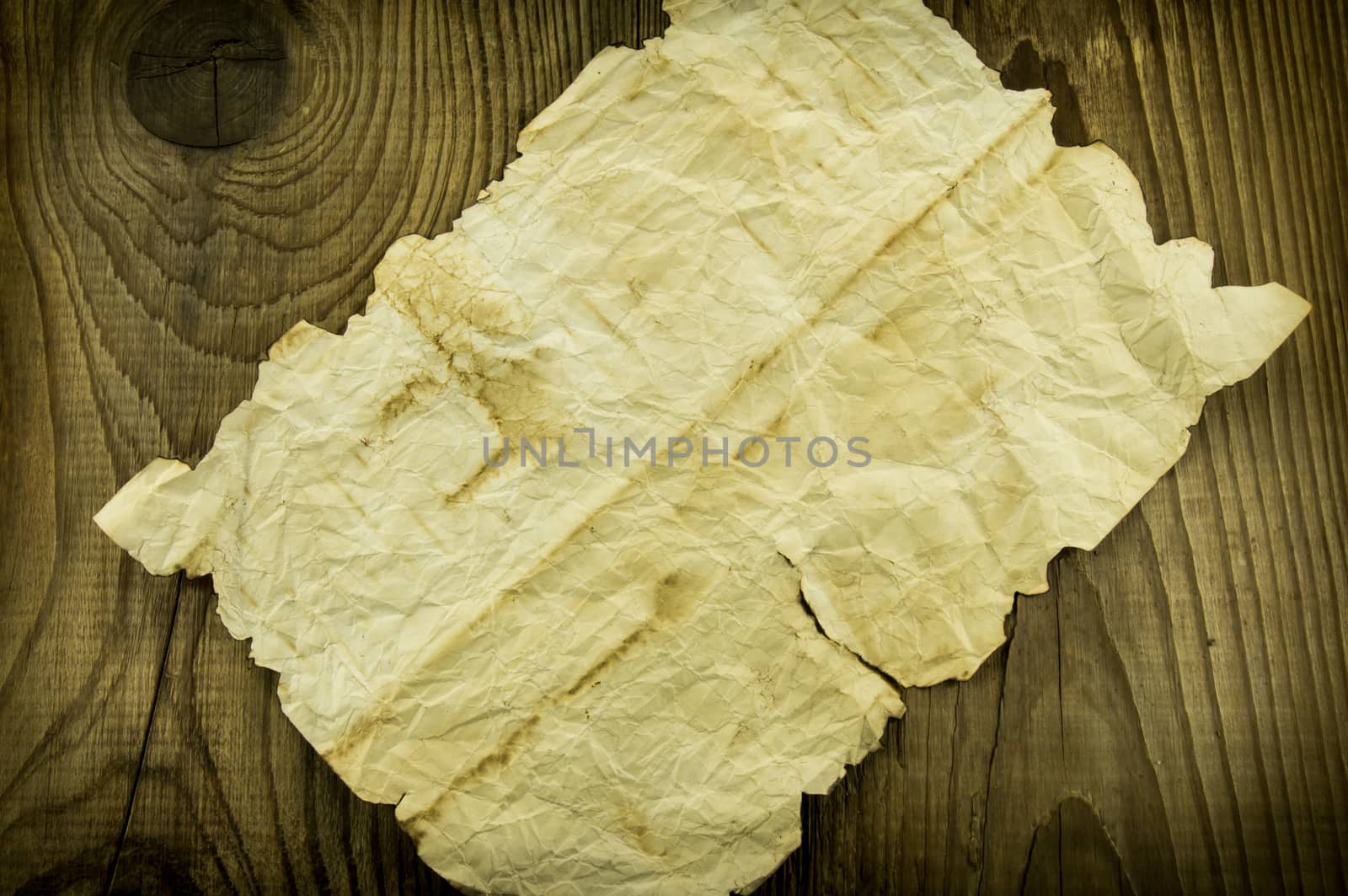 old paper on wood background. For your commercial and editorial use