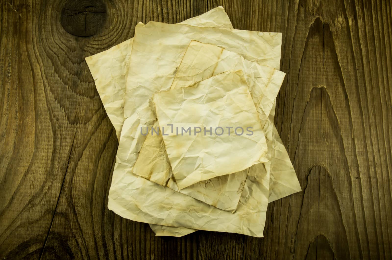 old paper on wood background. For your commercial and editorial use