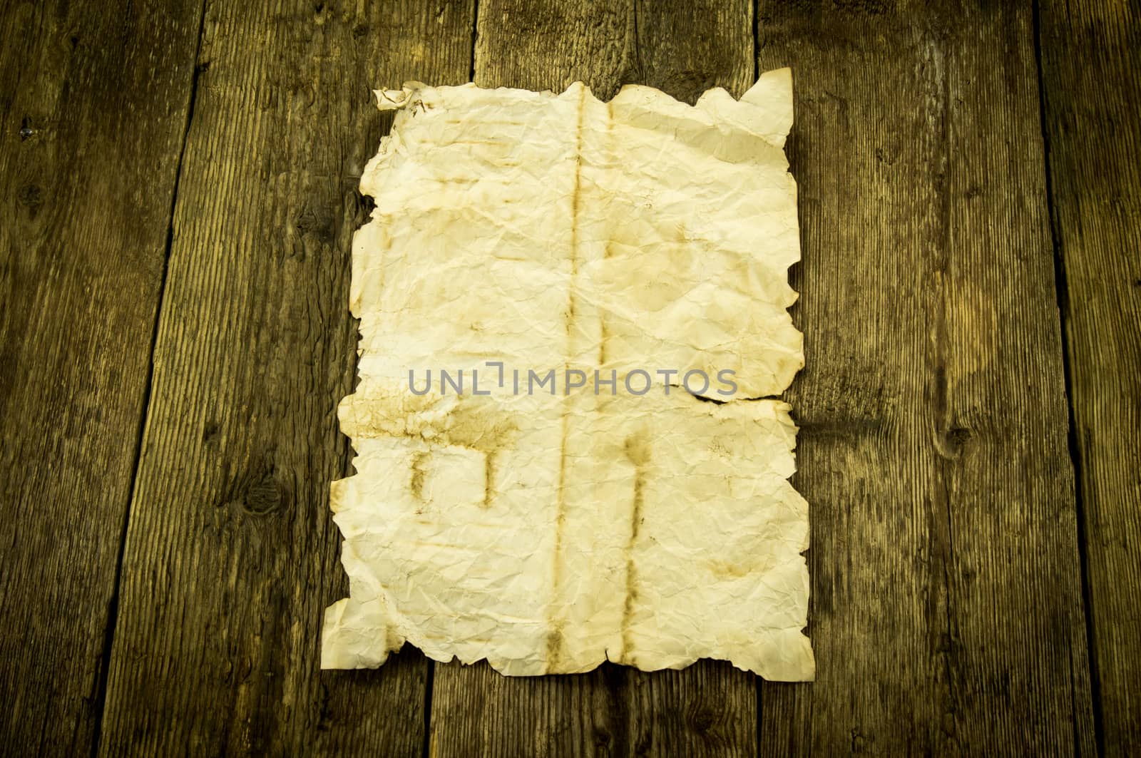 old paper on wood background. For your commercial and editorial use