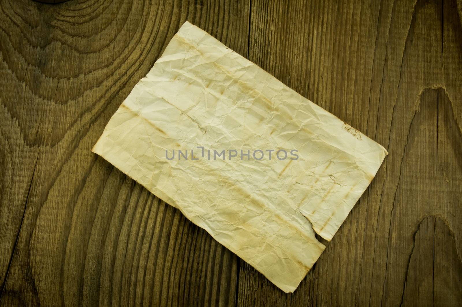 old paper on wood background. For your commercial and editorial use