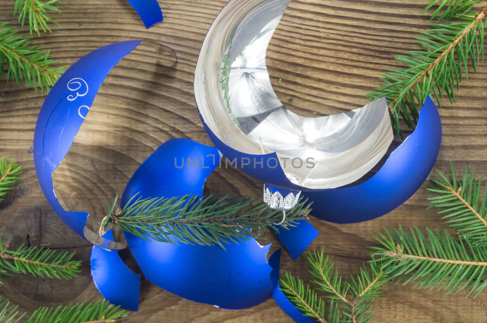 Broken Christmas Toy on wooden background. For your commercial and editorial use