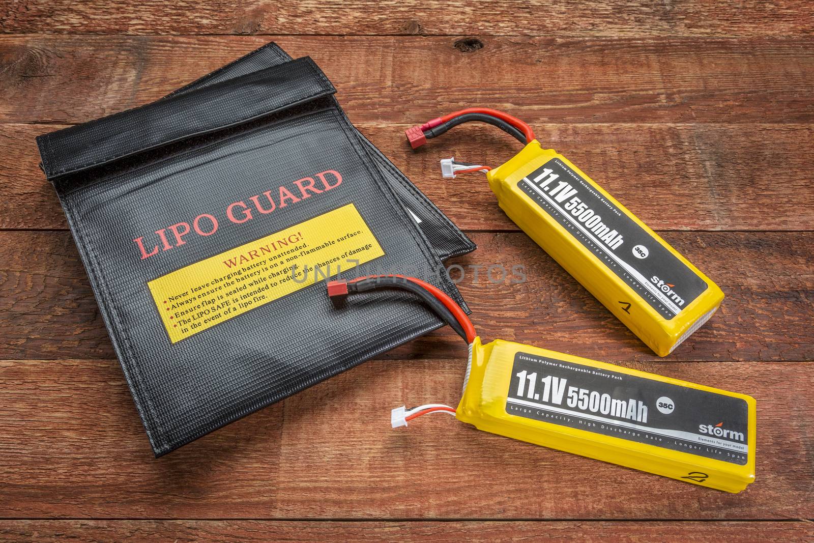 Fort Collins, CO, USA - March 18, 2015:  LiPo (lithium polymer) batteries used in drones and RC model with protective charging bags.