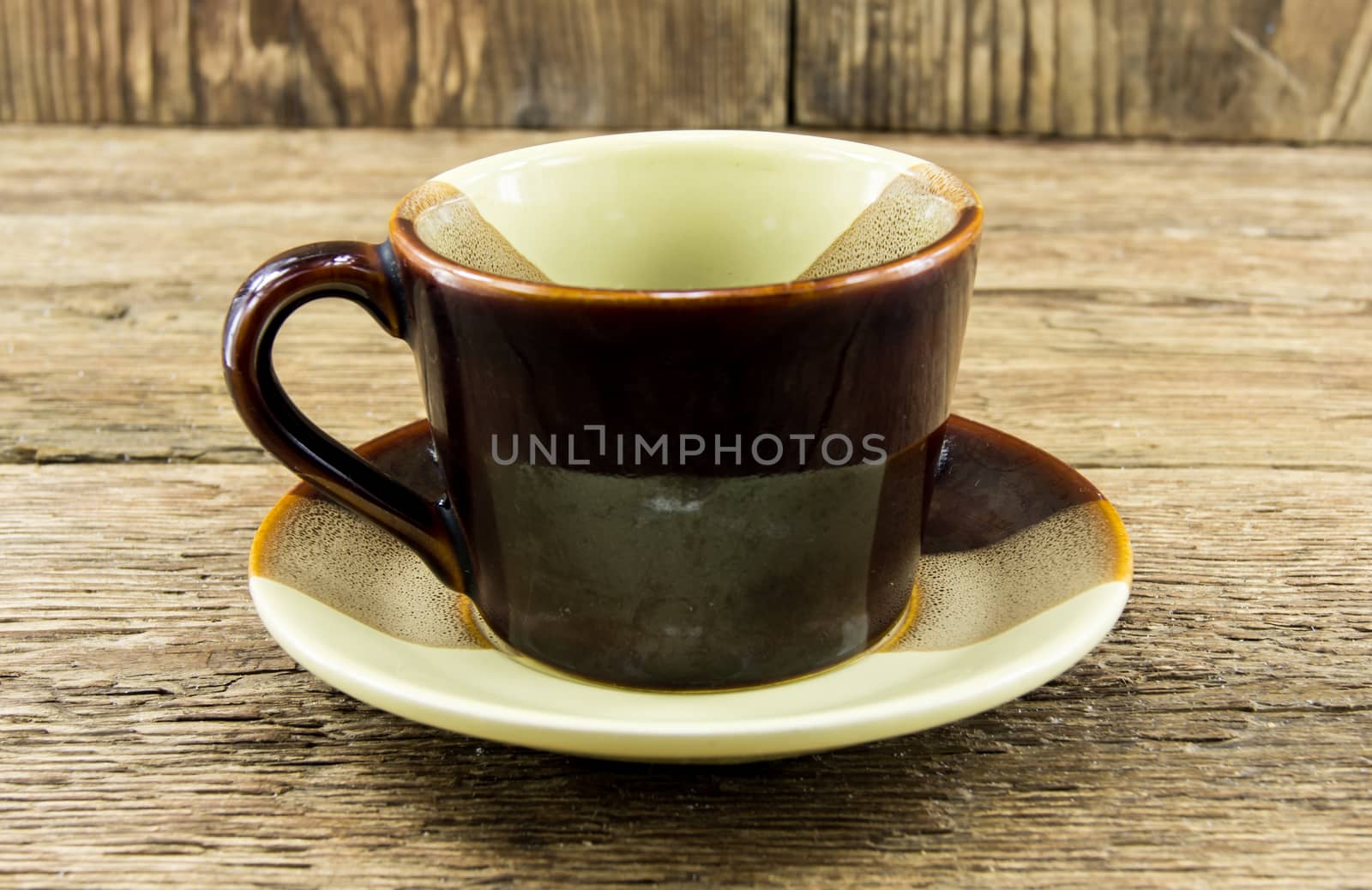 Cup of coffee on a wooden background by serhii_lohvyniuk