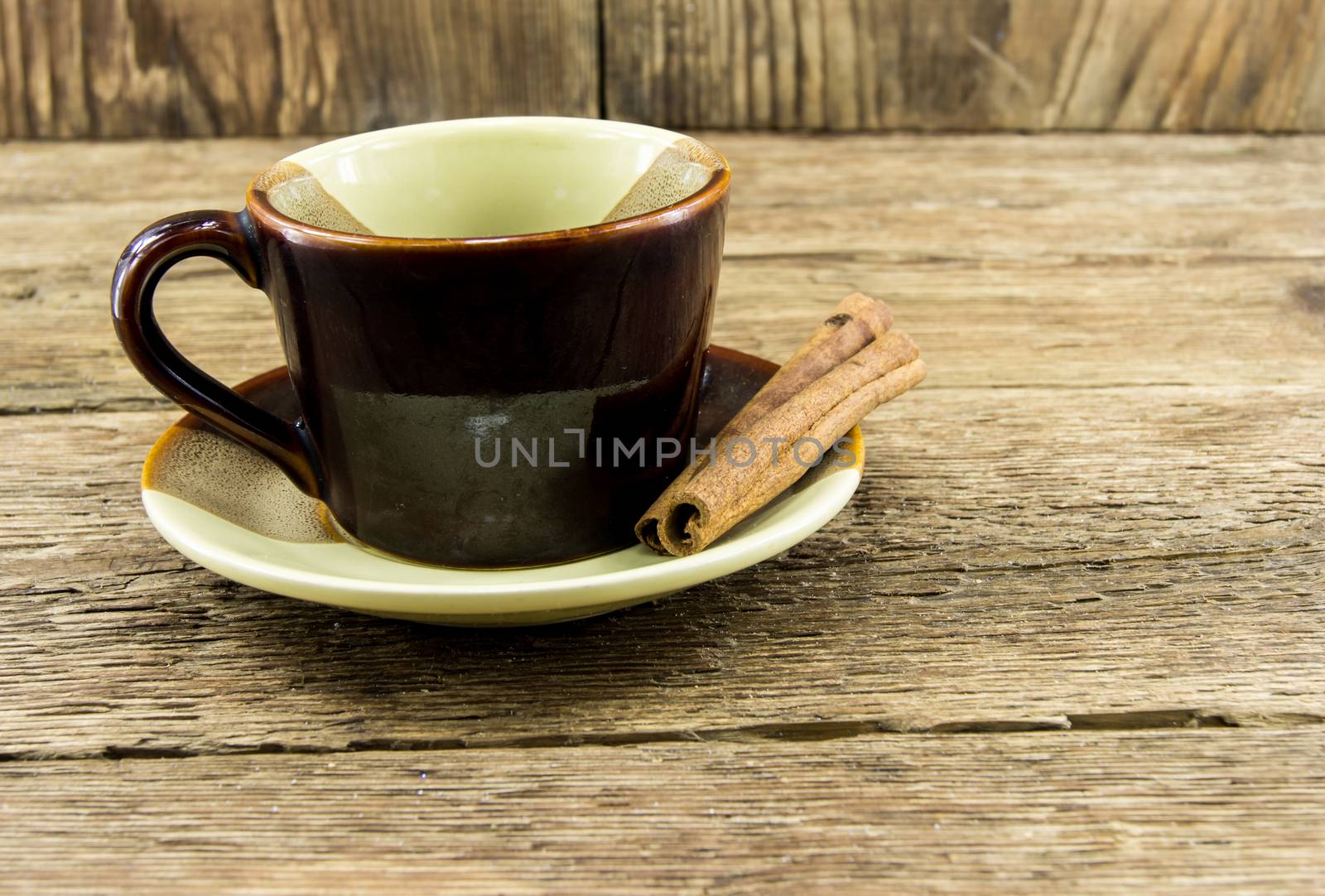 Cup of coffee on a wooden background by serhii_lohvyniuk