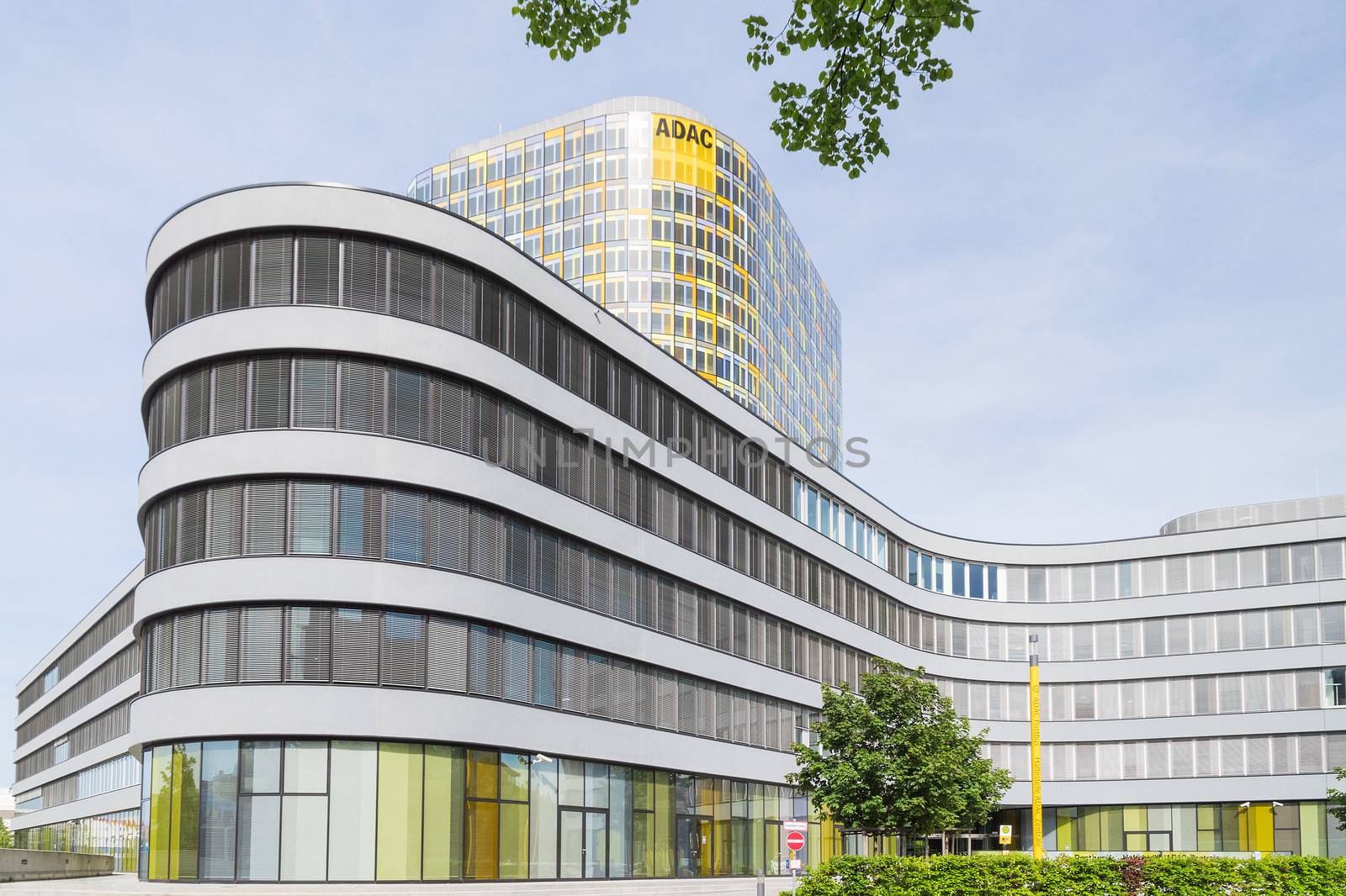 Munich, Germany - May 12, 2015: New headquarters of German car owners association. ADAC is an automobile club providing emergency rescue and technical repair services on European roads.
