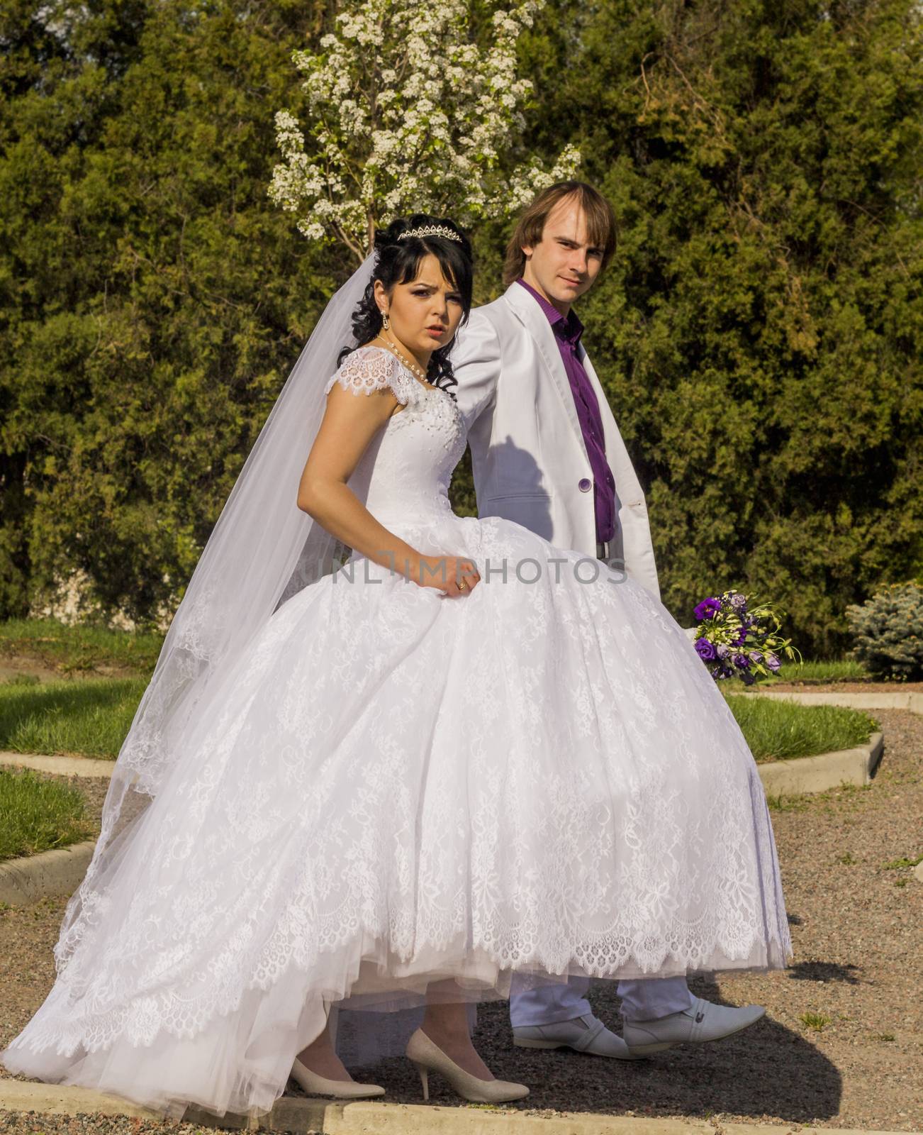 couple in love bride and groom together in wedding summer .