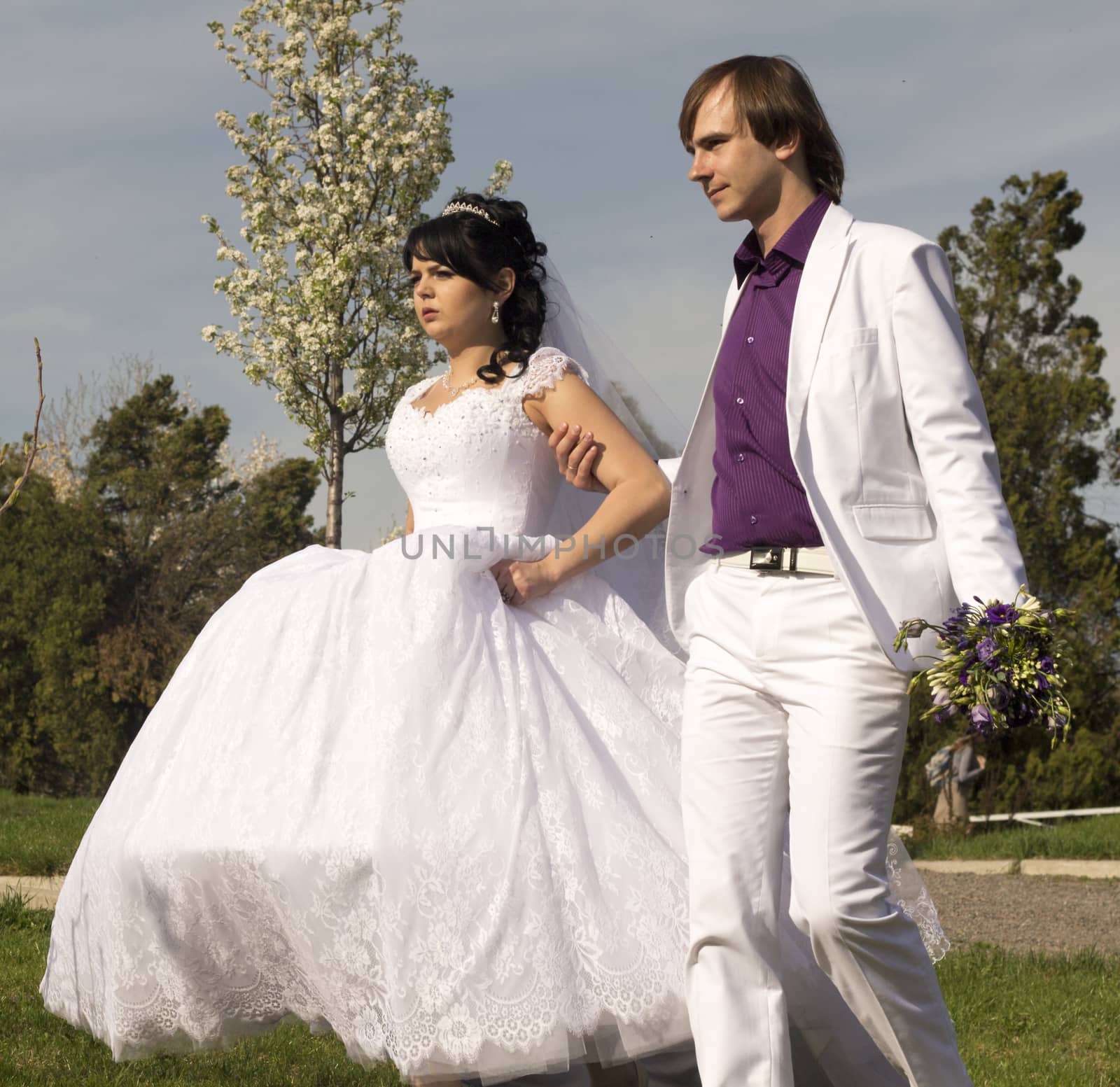 couple in love bride and groom together in wedding summer .