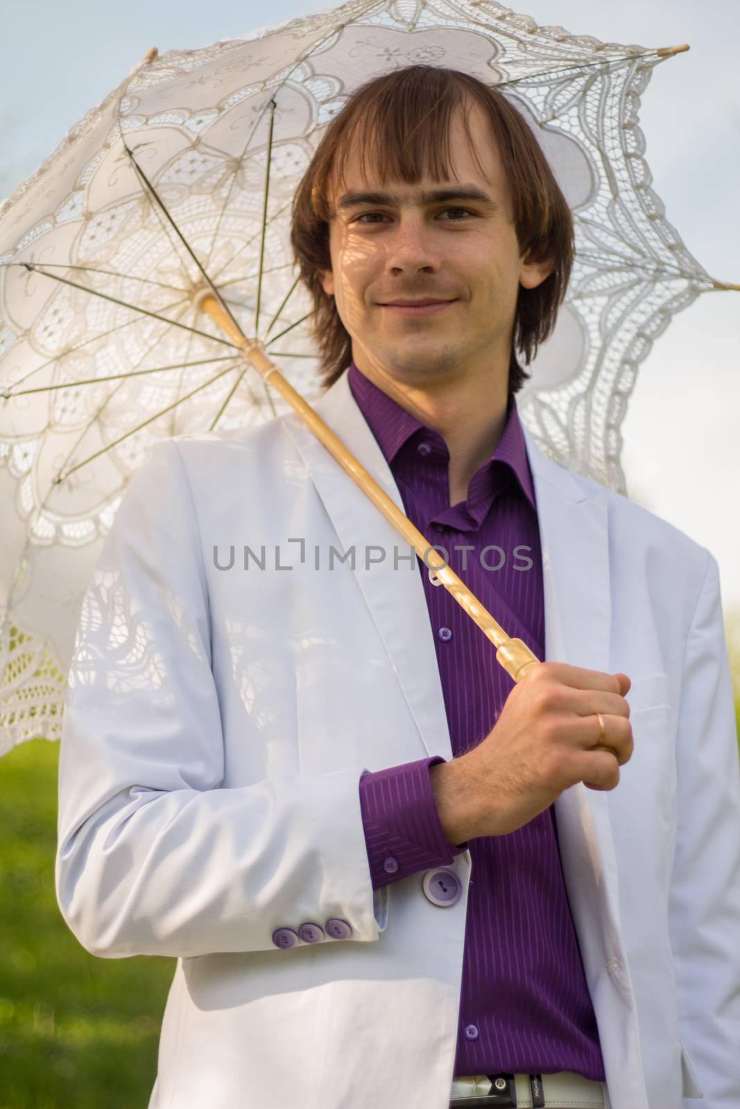 elegant man with umbrella by serhii_lohvyniuk