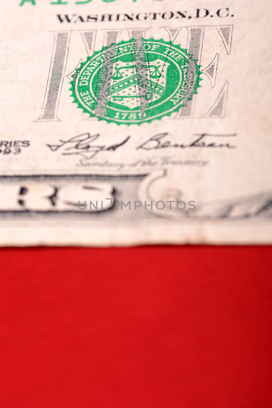 dollars on american flag by fotoscool