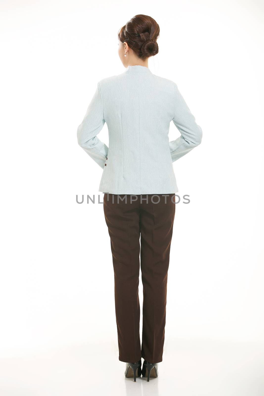 dressed in overalls who stand in front of a white background