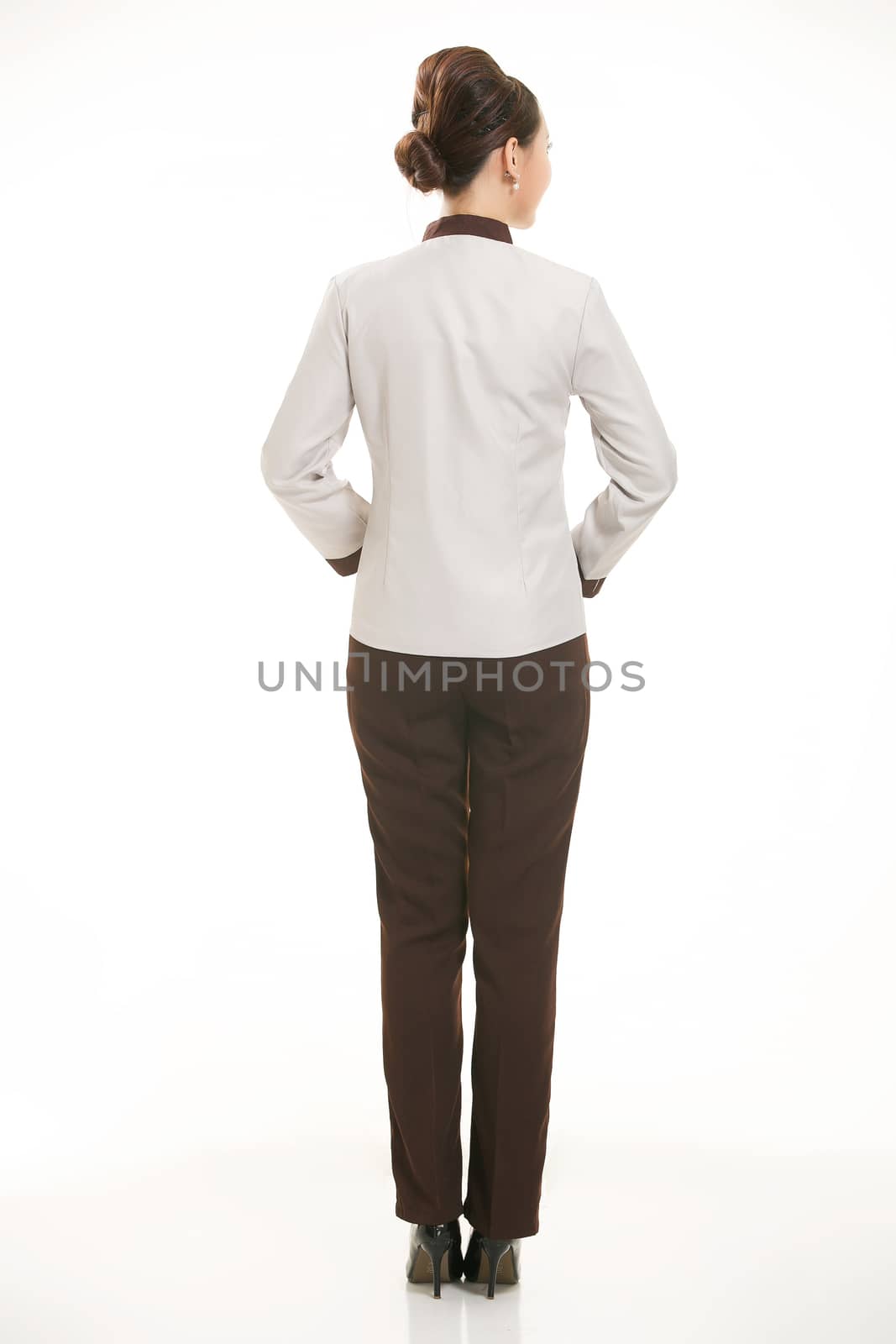 dressed in overalls who stand in front of a white background