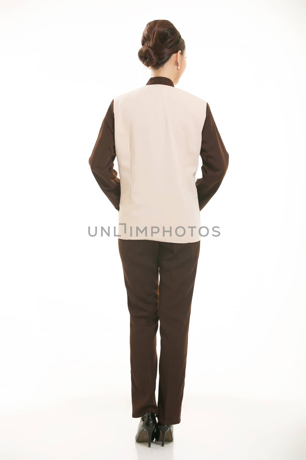 dressed in overalls who stand in front of a white background