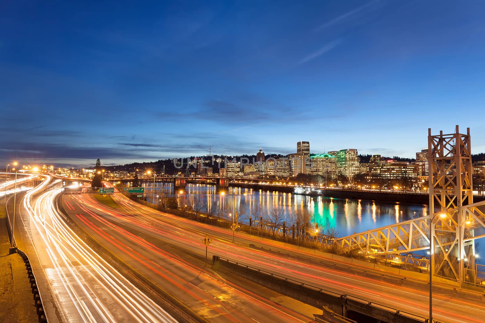 Portland Oregon Downtown Cityscape with Freeway Traffic Light Trails during Evening Blue Hour