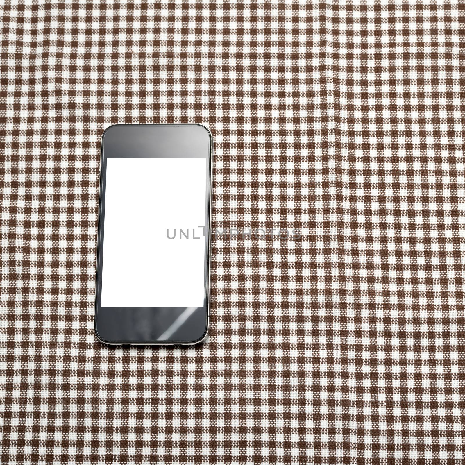 smart phone on kitchen towel background