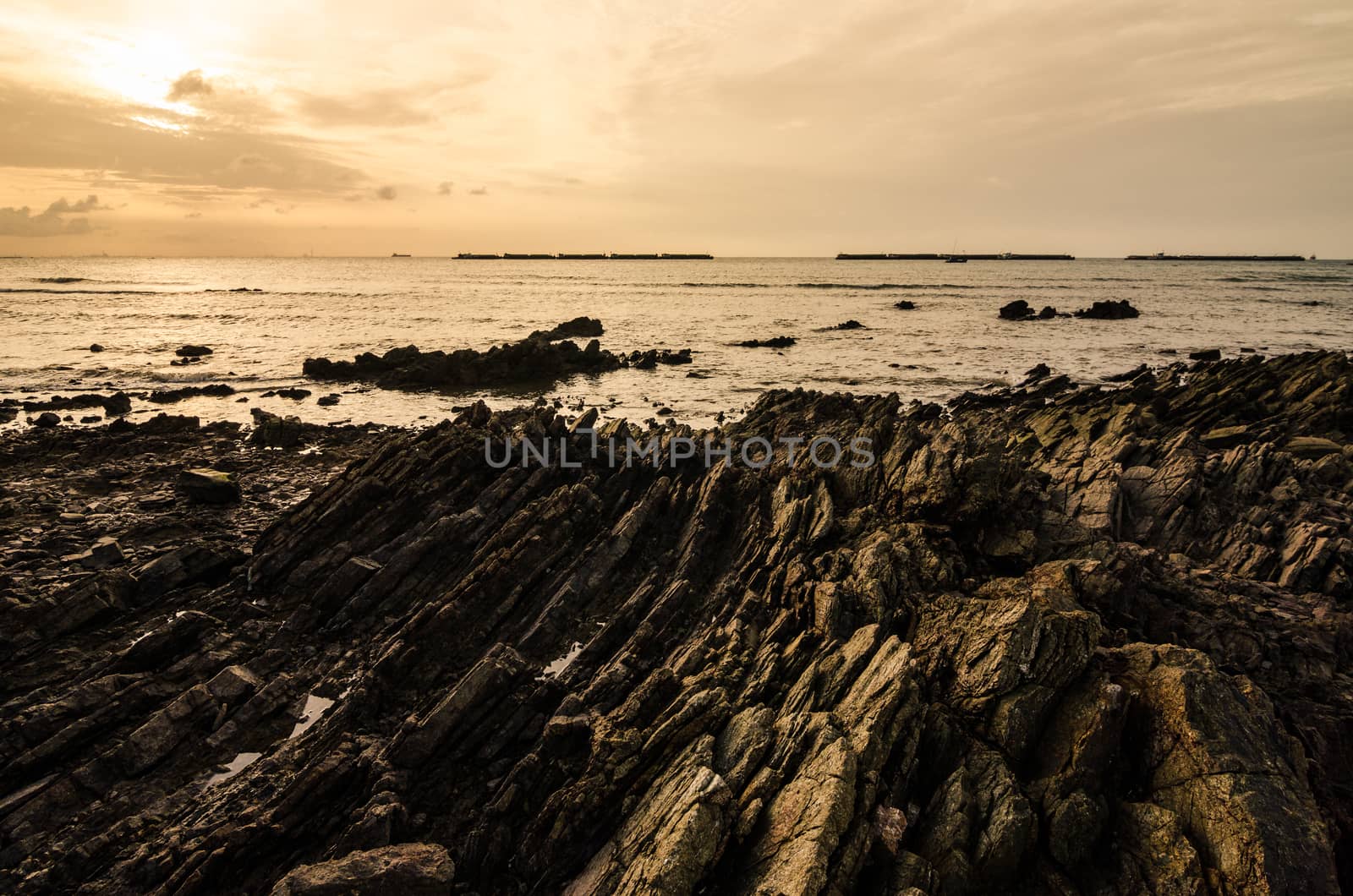 Rock and sea morning  light in Thailand