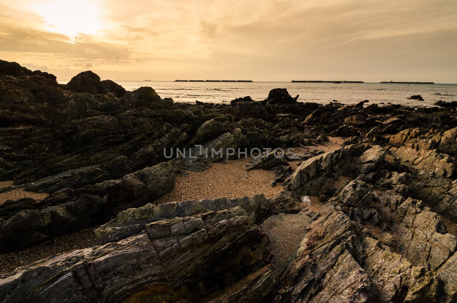 Rock and sea in the morning by sweetcrisis