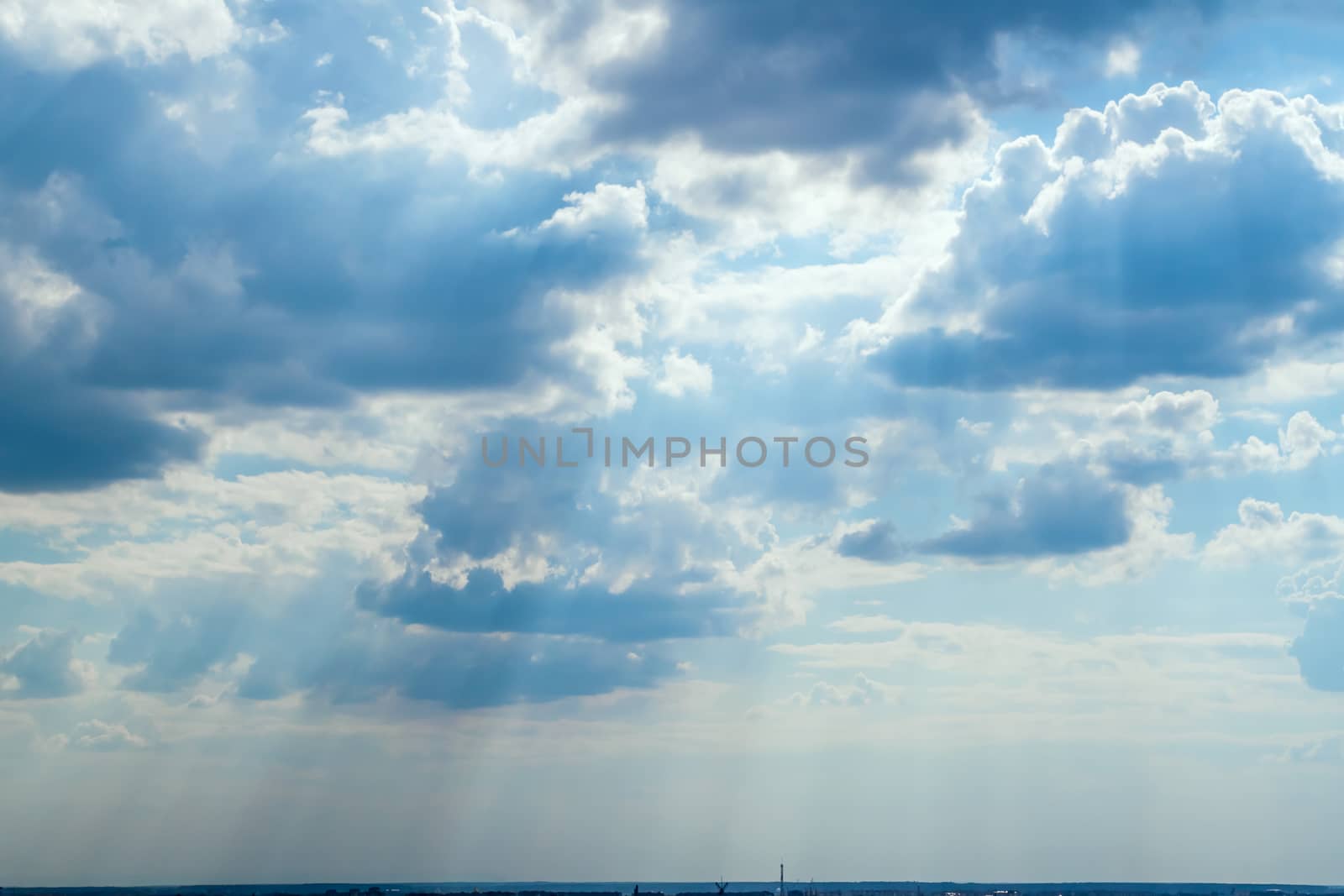 cloudy sky with sun rays by Chechotkin