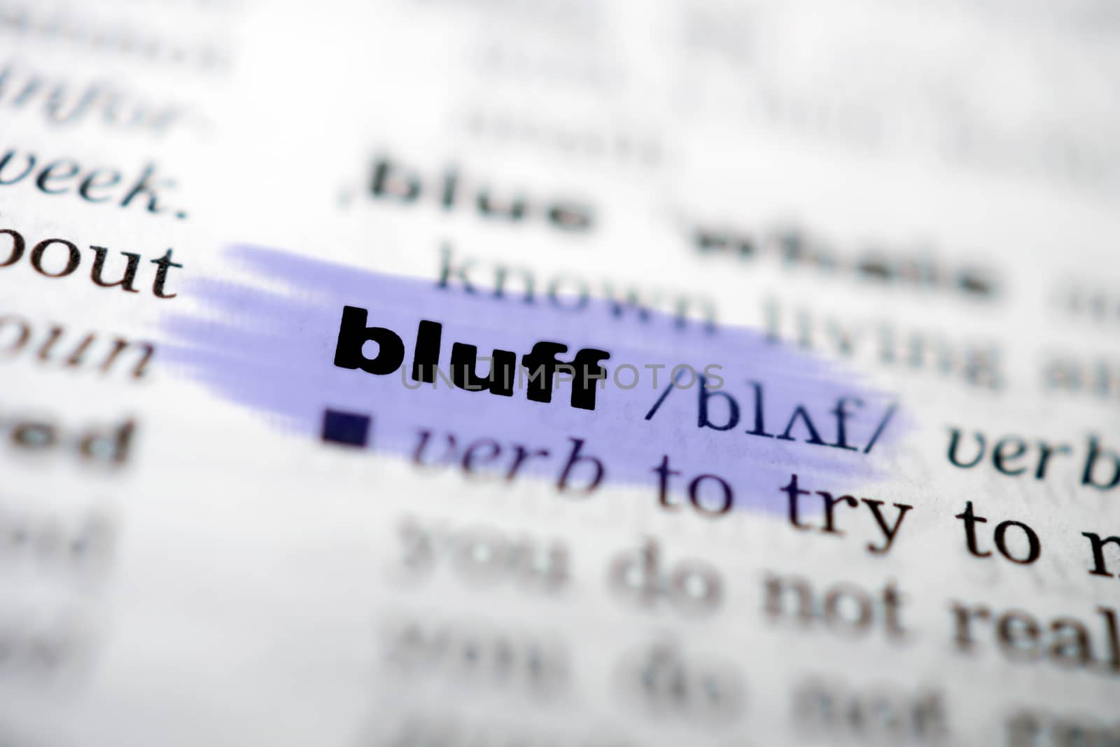 Closeup page with text BLUFF in colored highligh
