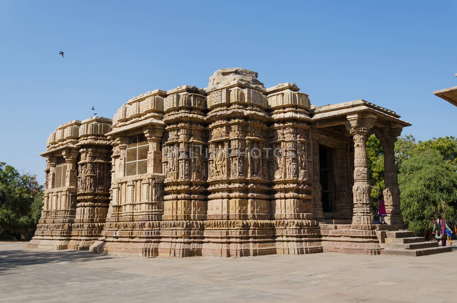 Ahmedabad, India - December 25, 2014: Tourist visit Sun Temple Modhera in Ahmedabad, India on December 25, 2014. It was built in 1026 AD by King Bhimdev of the Solanki dynasty.