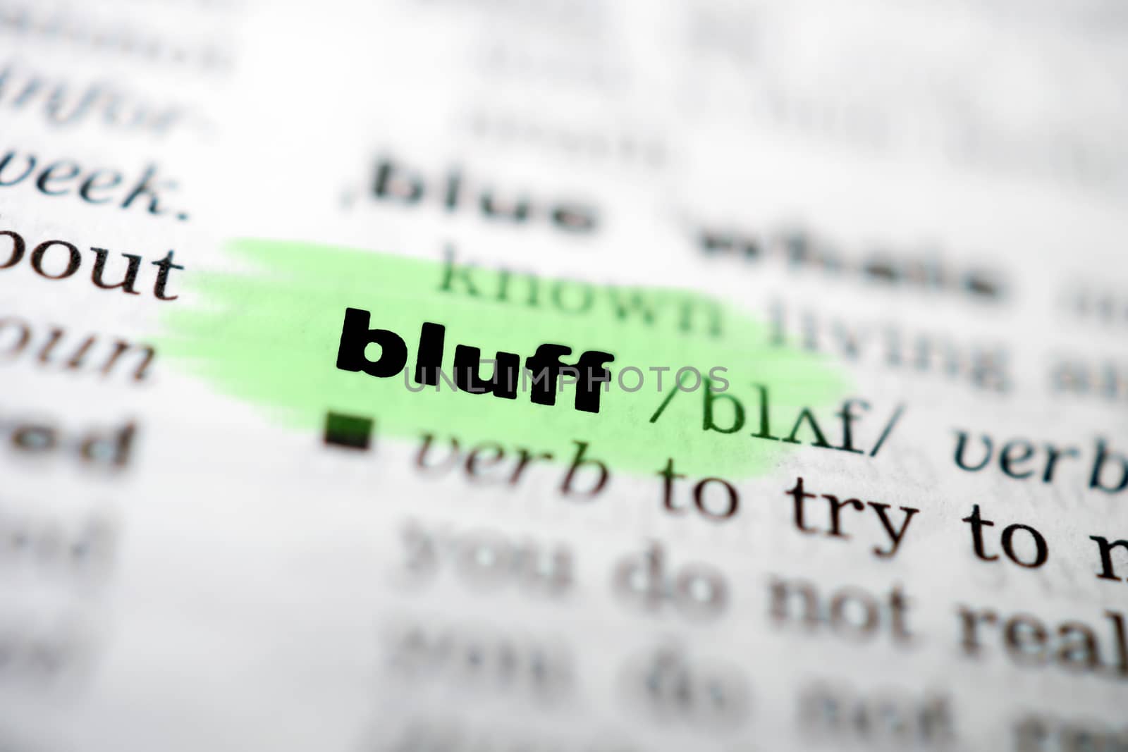 Closeup page with text BLUFF in colored highligh