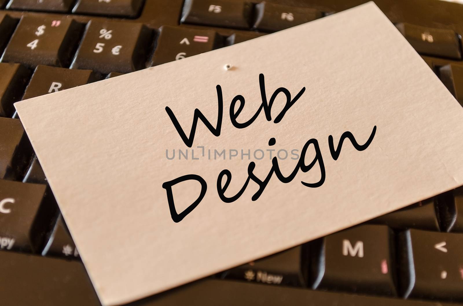 Web Design Concept on black keyboard