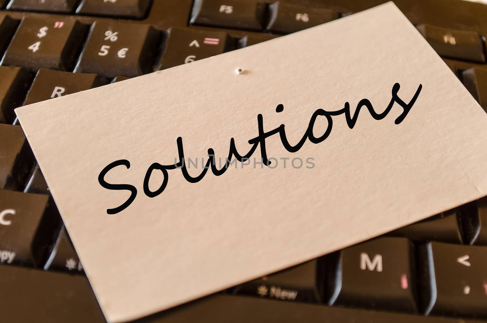 Solutions Concept on black keyboard