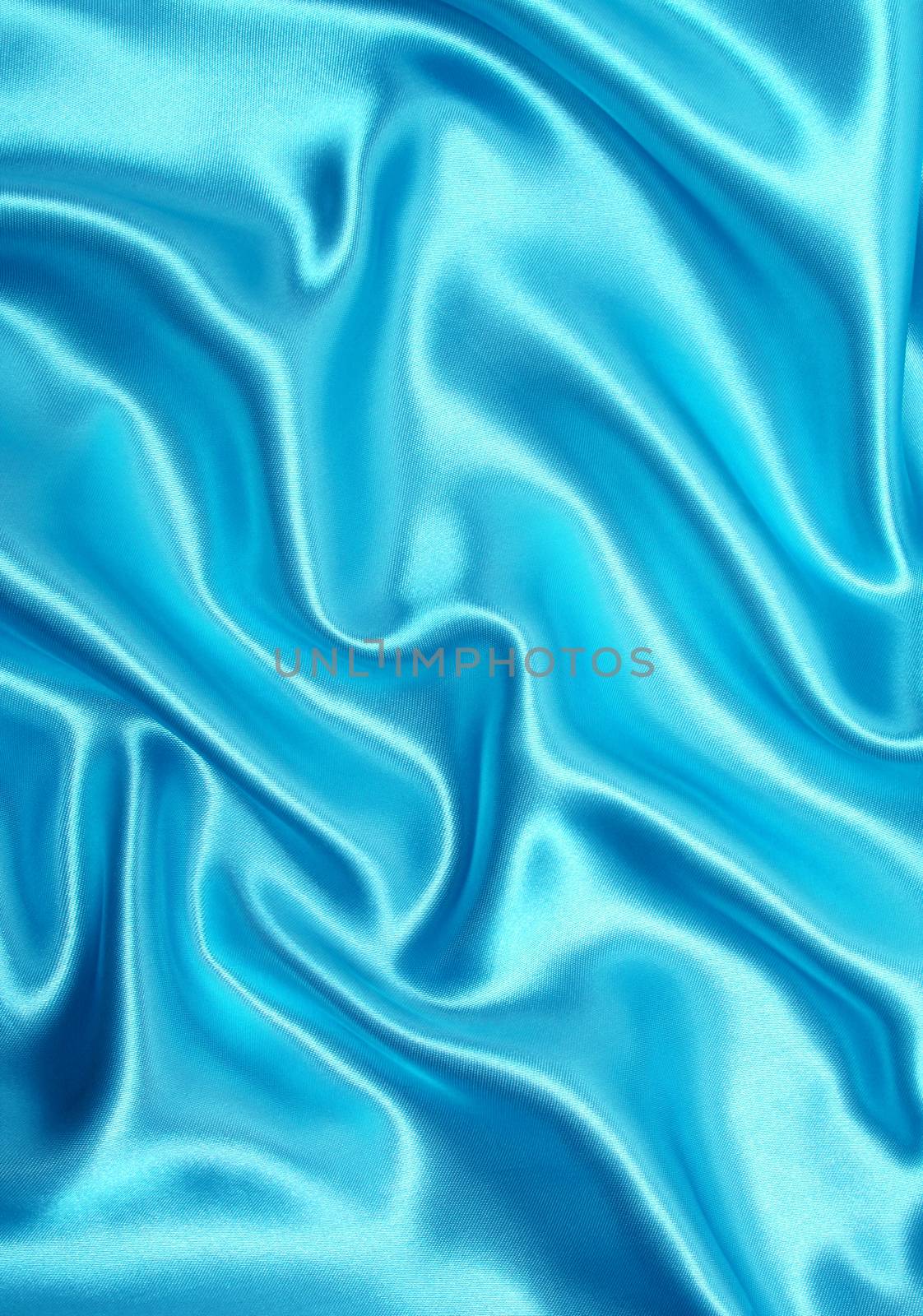 Smooth elegant blue silk or satin can use as background