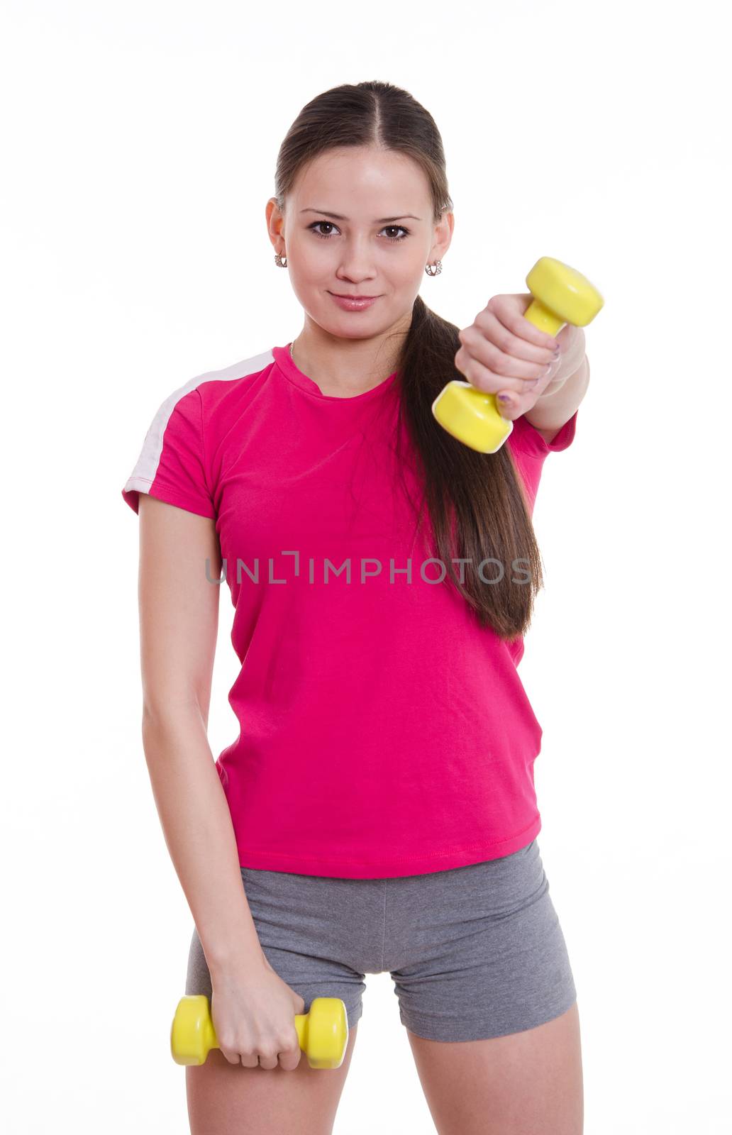 Young beautiful girl holds Europeans physical exercise