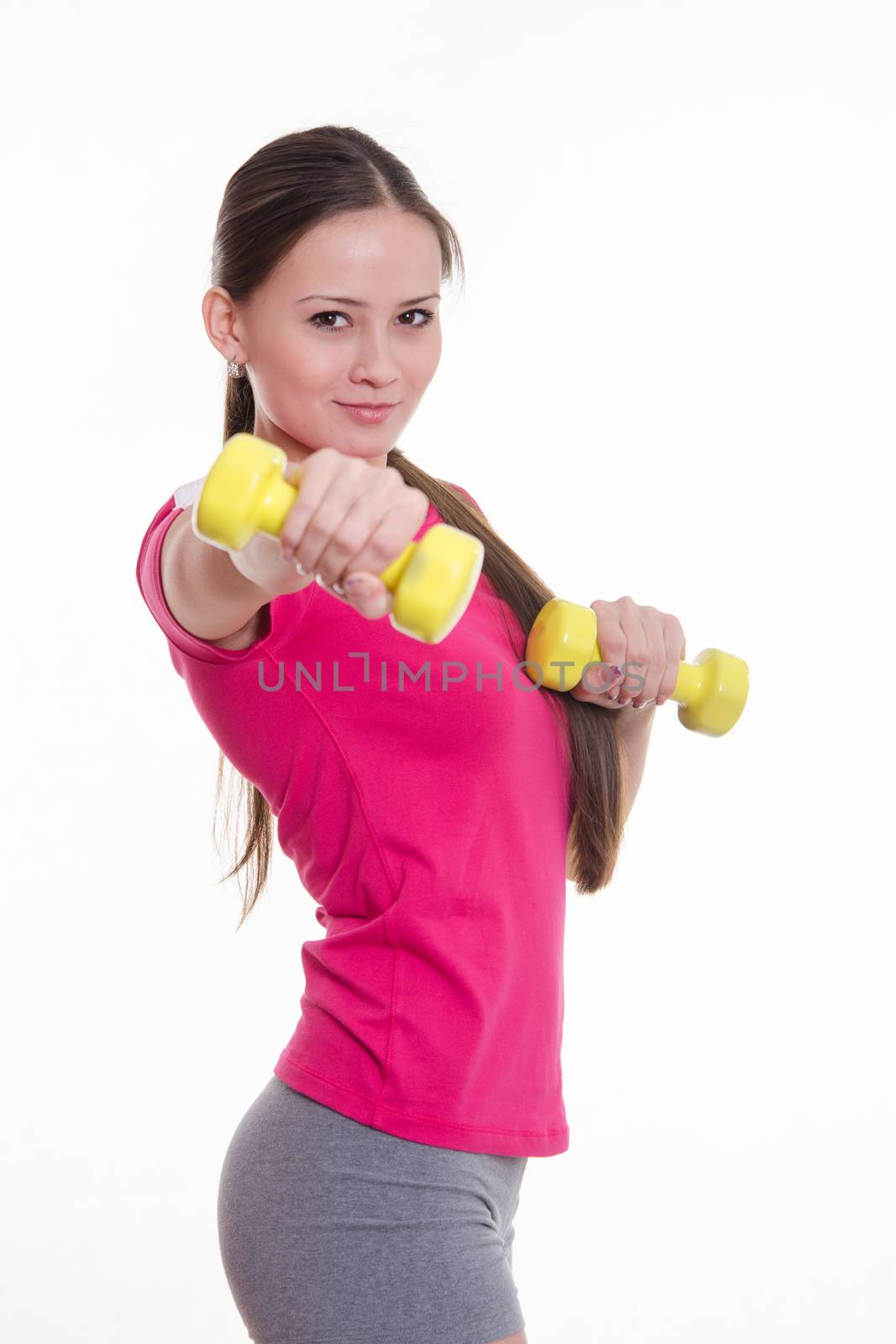 Young beautiful girl holds Europeans physical exercise