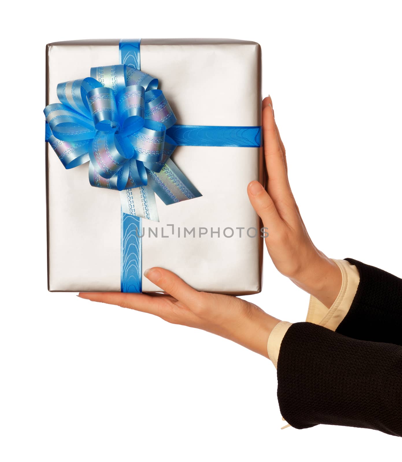 woman giving a silver box with blue bow as a gift