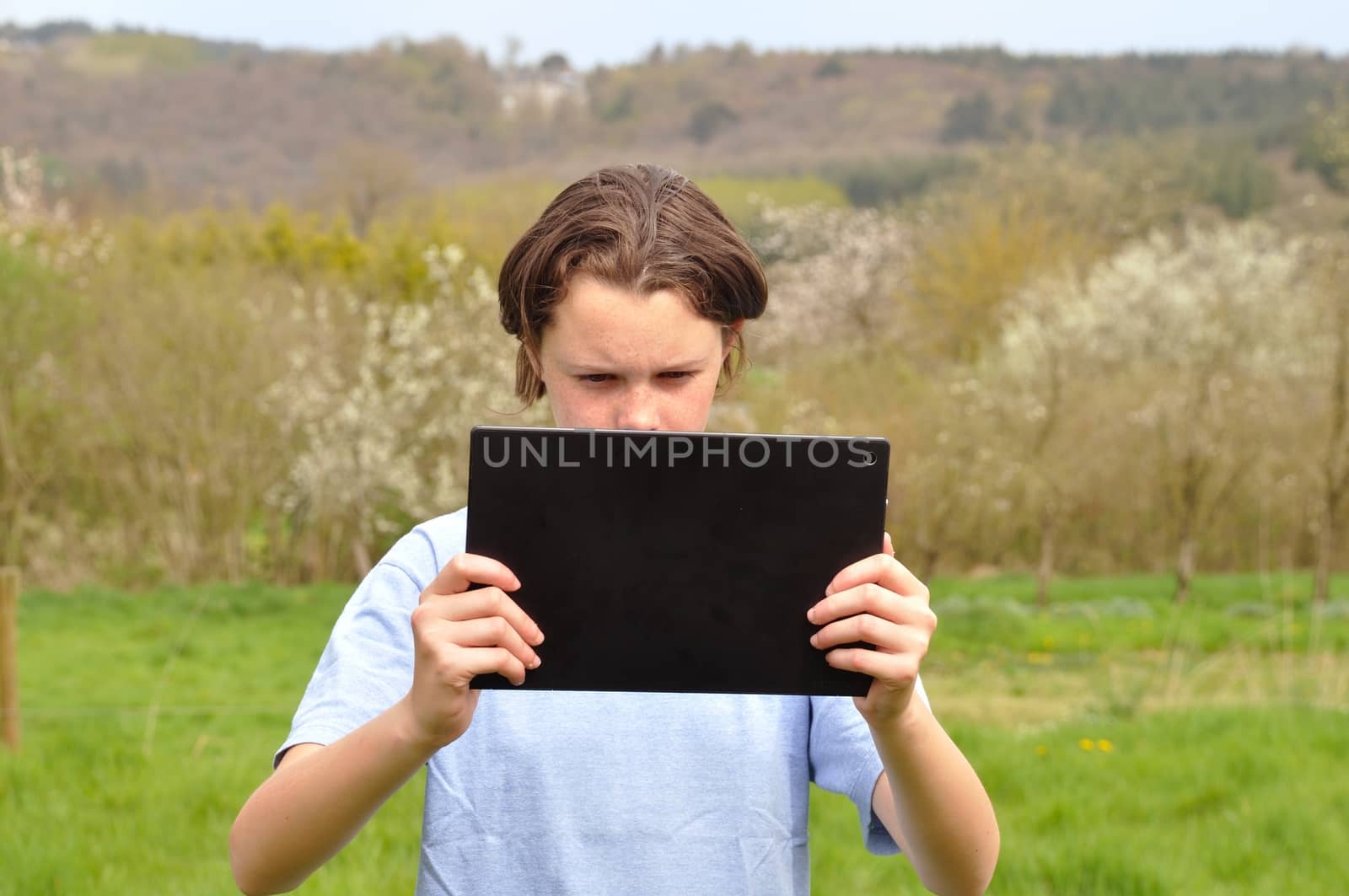 Girl using digital tablet by BZH22