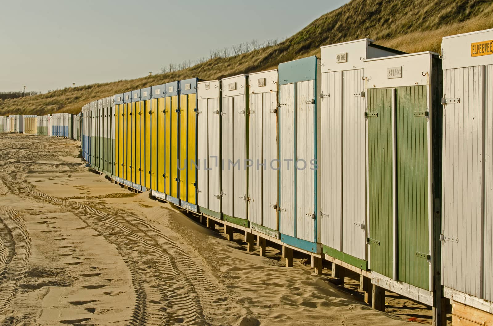 Beach huts on the beach of Zoutelande in the Netherlands by Tofotografie