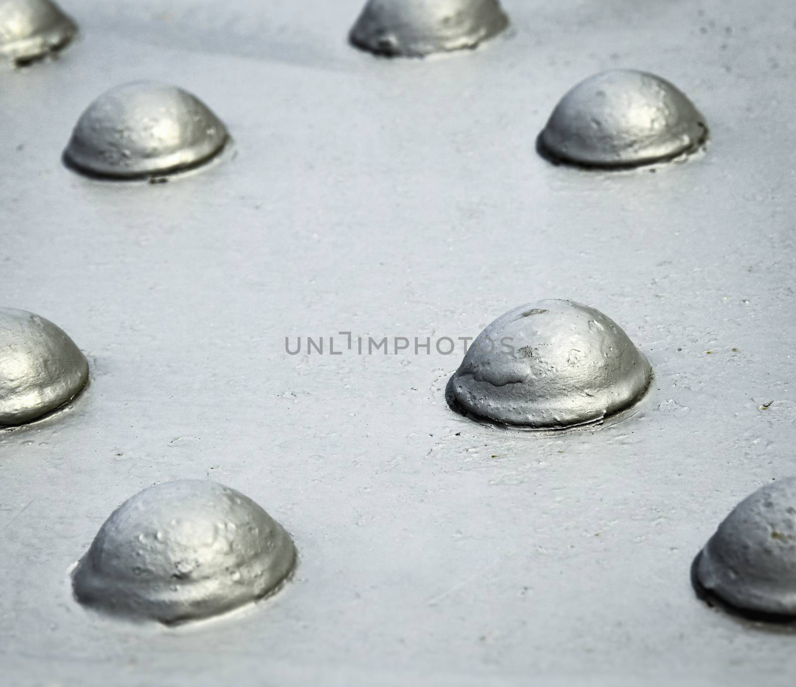 abstract background or texture Grey steel rivets