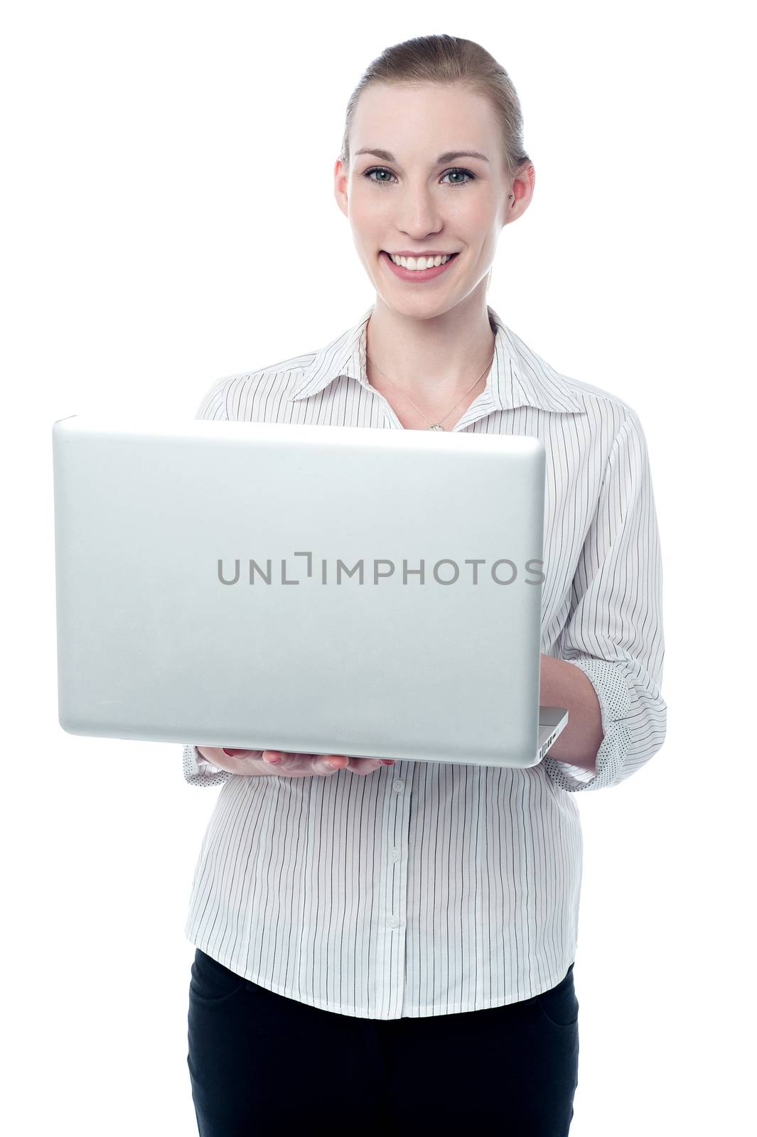 Corporate woman holding a laptop computer
