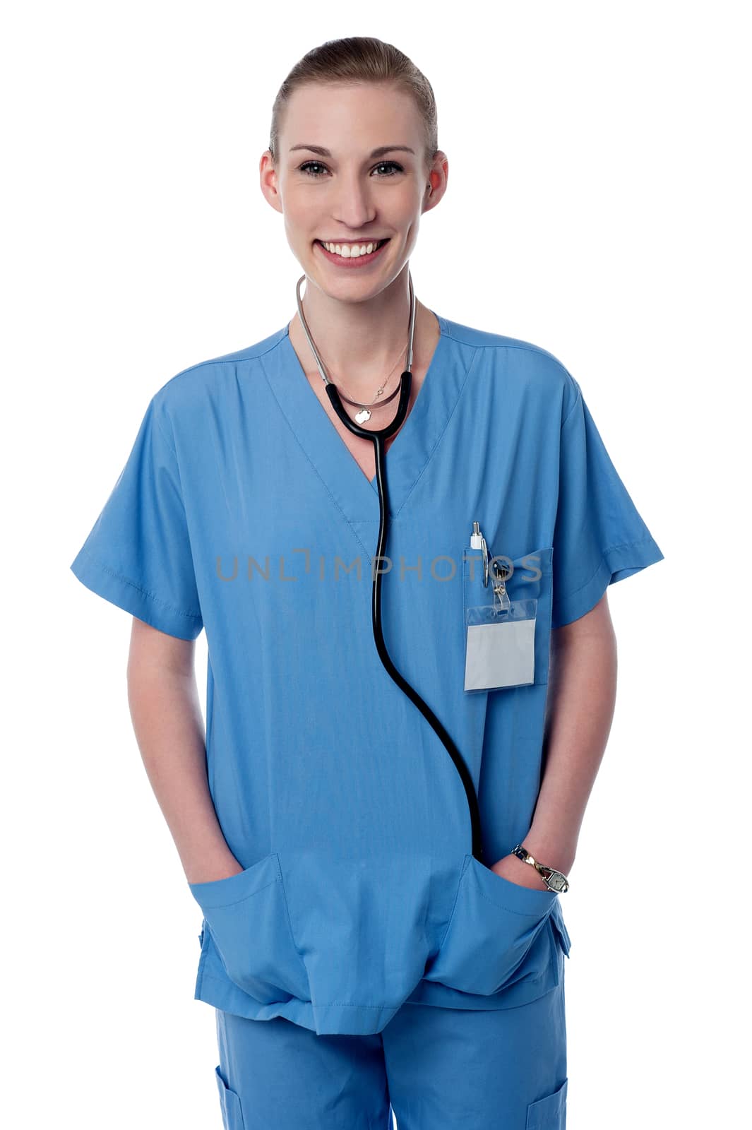 Friendly female doctor with hands in her pockets