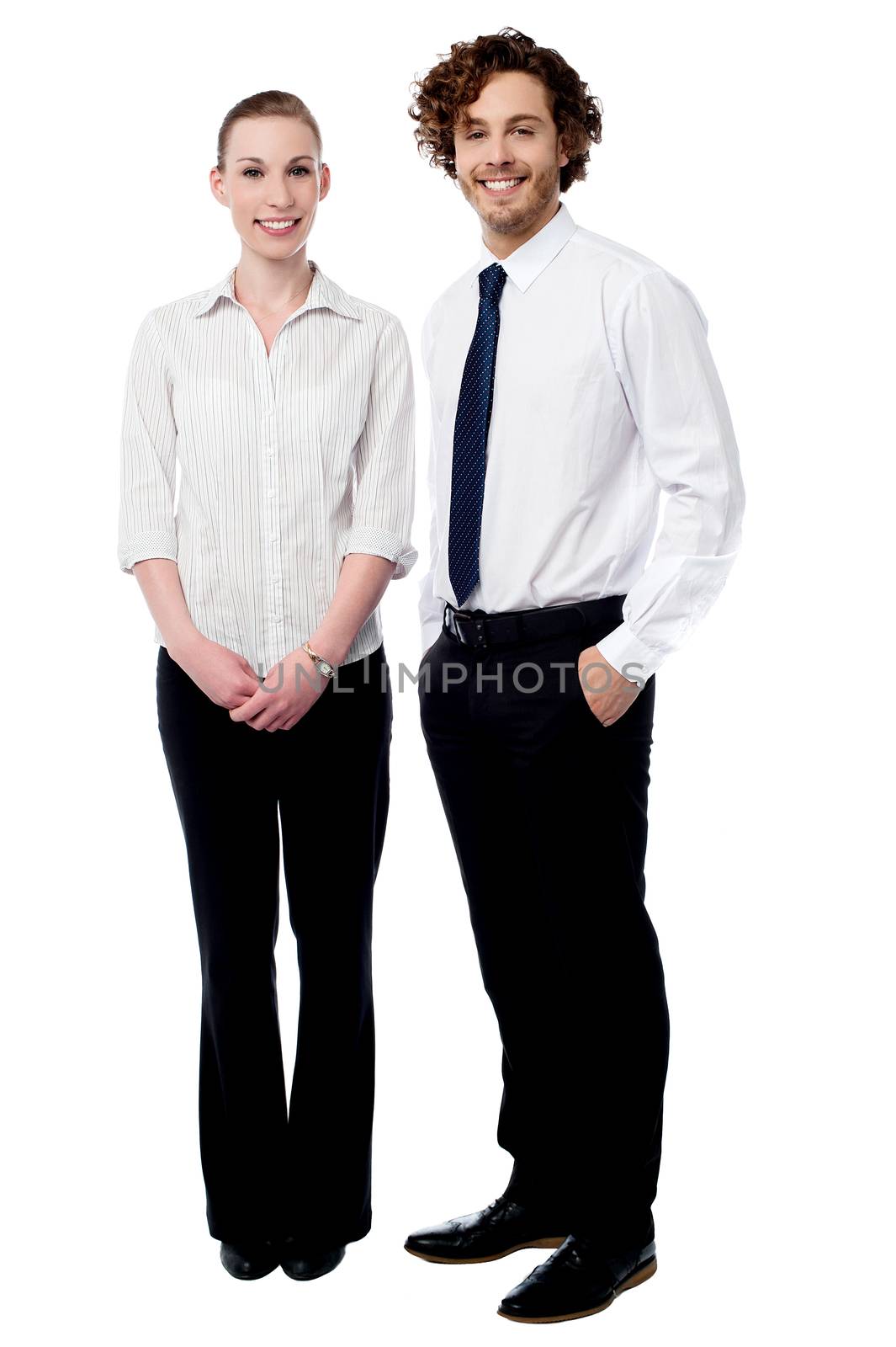 Full length of business couple posing together