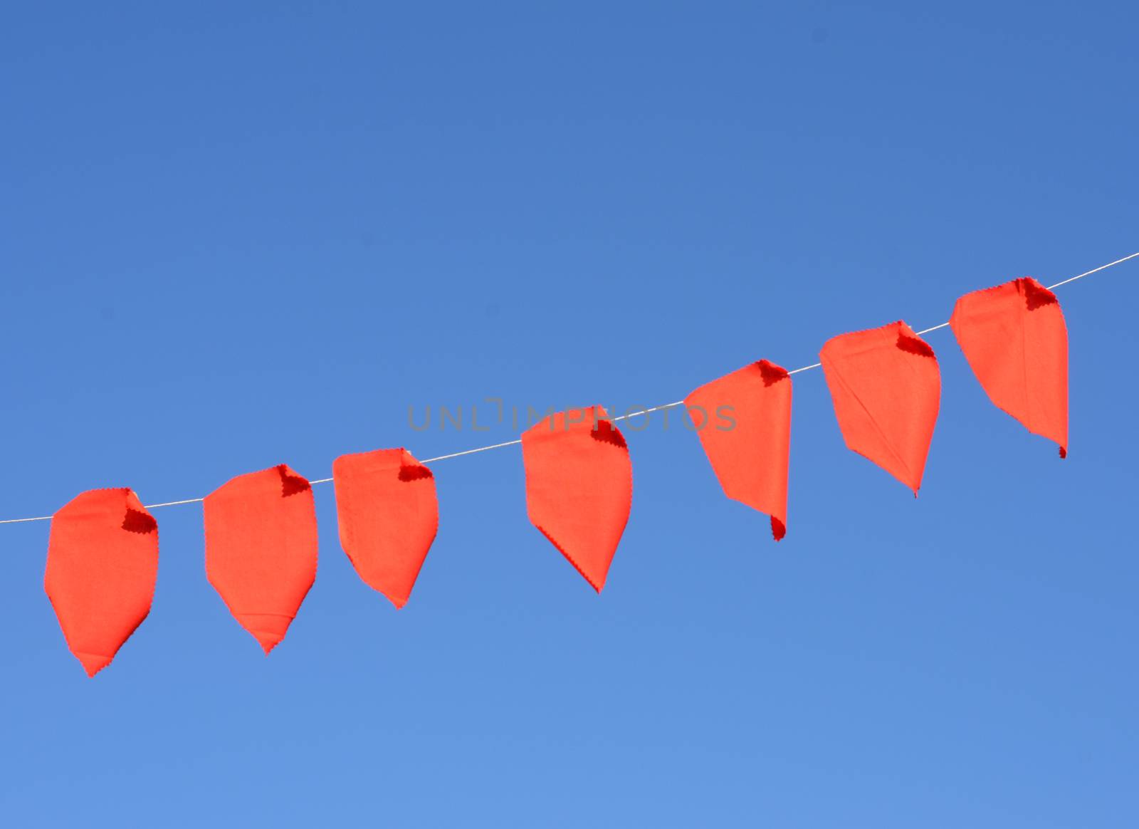 red fabric flags by sarkao