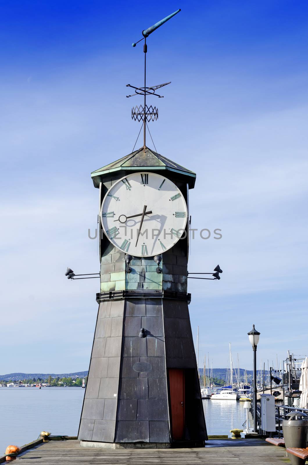 Lighthouse at Aker Brygge in Oslo by Nanisimova