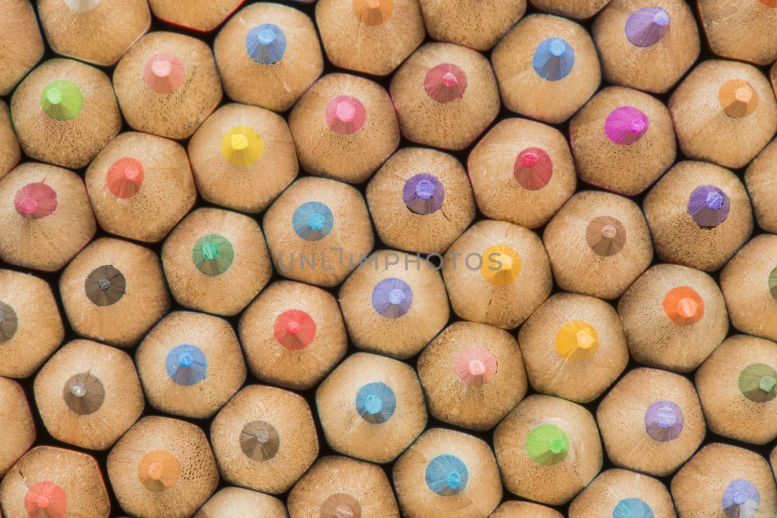 Abstract composition of a set wooden colour pencils by Tofotografie