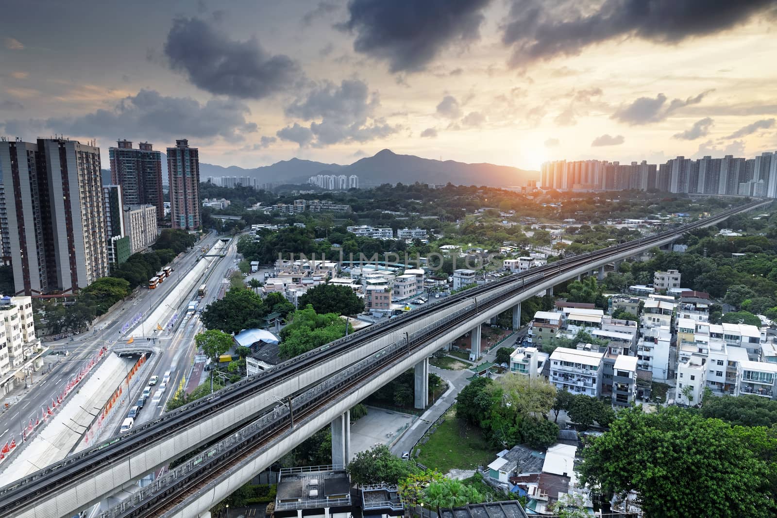 Long Ping, hong kong urban downtown and sunset speed train at night