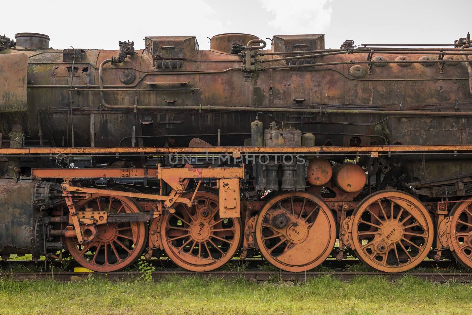 Old rusted steam locomotive by Tofotografie