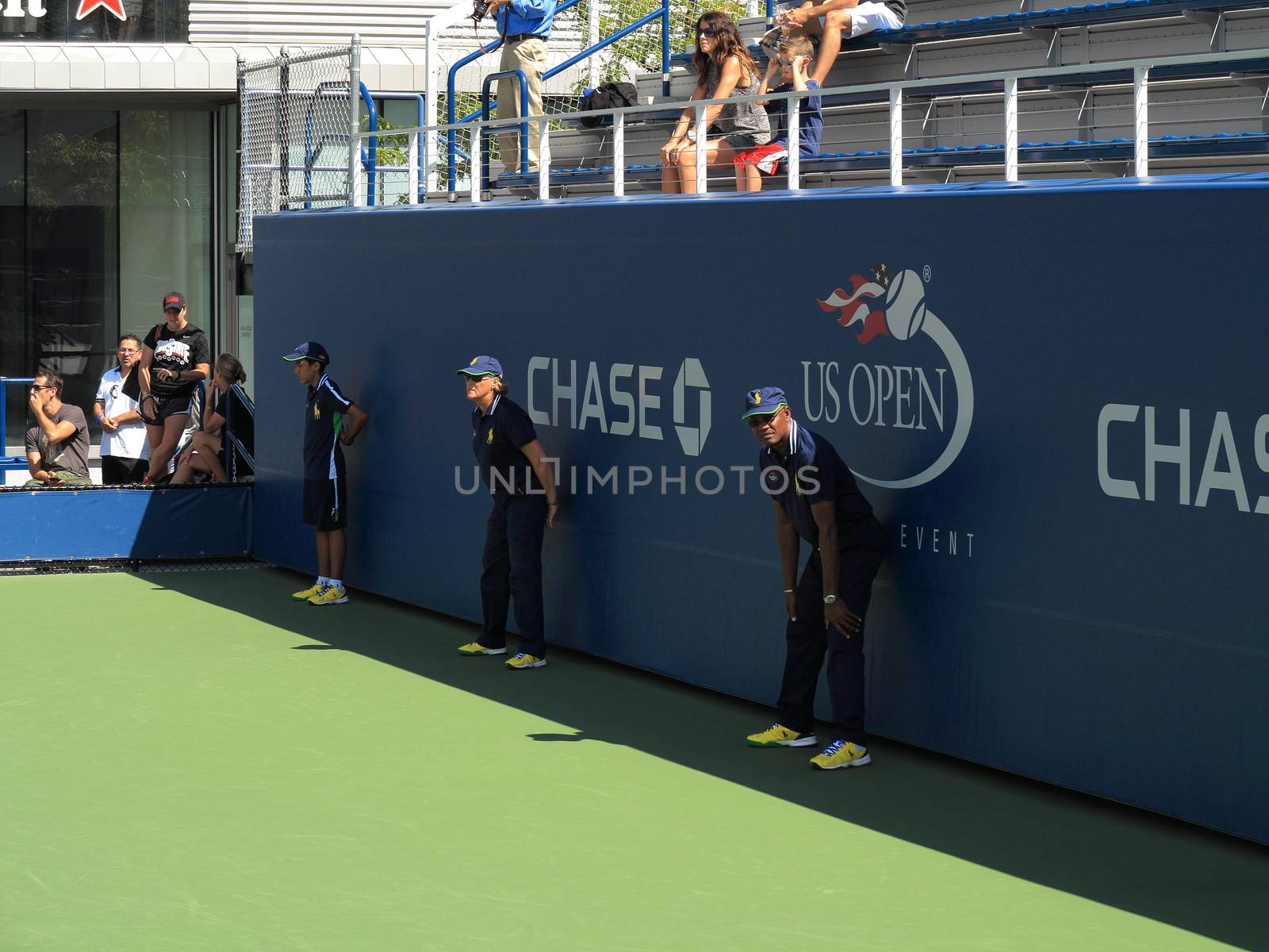 US Open Linesman and lineswoman on a side court at the Billie Jean King Tennis Center.