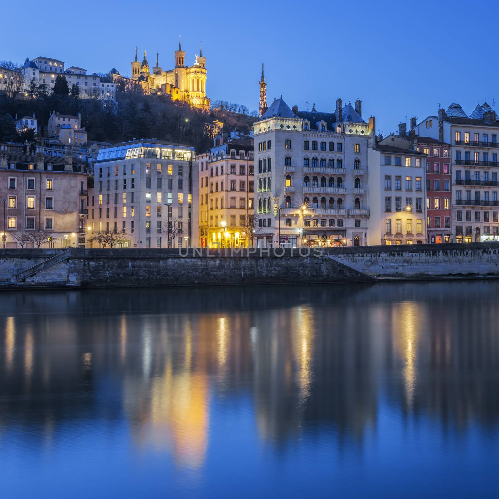 View of Lyon with Saone river by night, France.