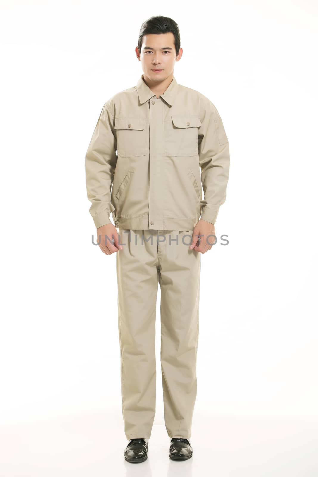 The young engineer various occupation clothing standing in front of a white background