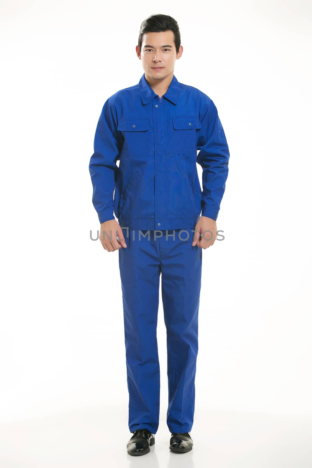 The young engineer various occupation clothing standing in front of a white background