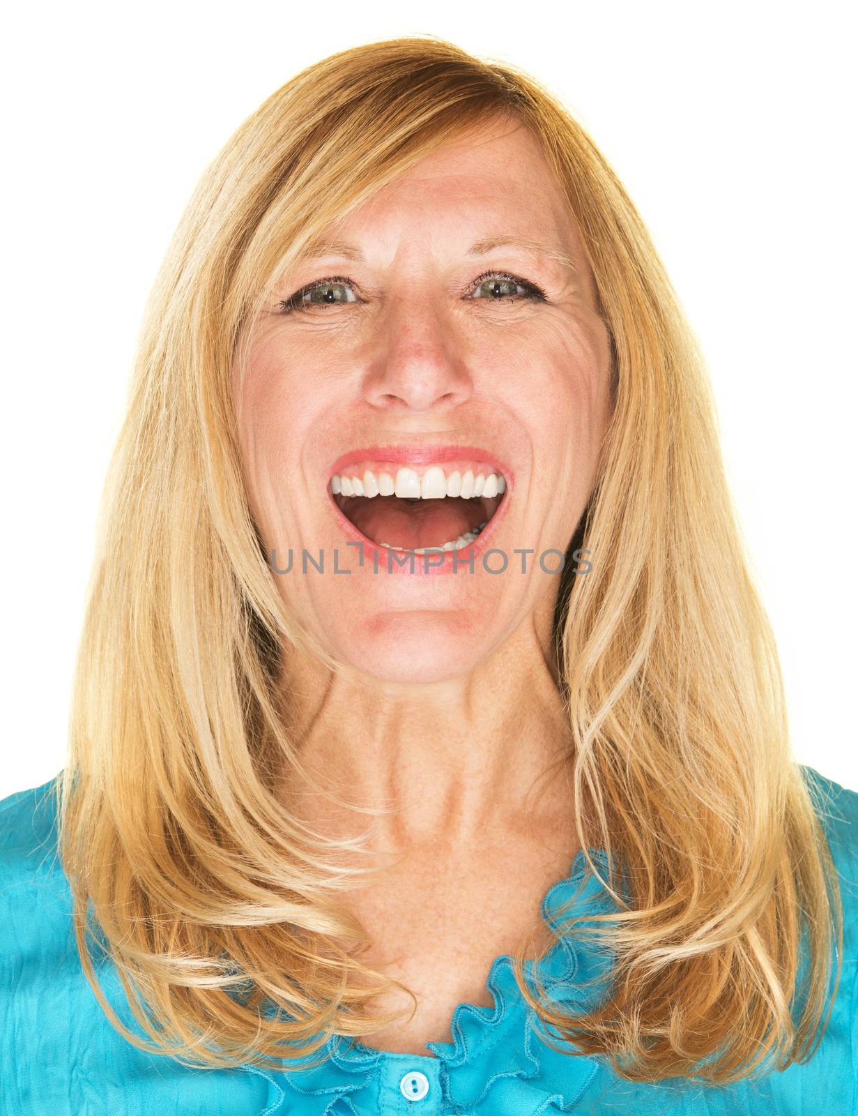 Beautiful single middle aged woman in blue laughing