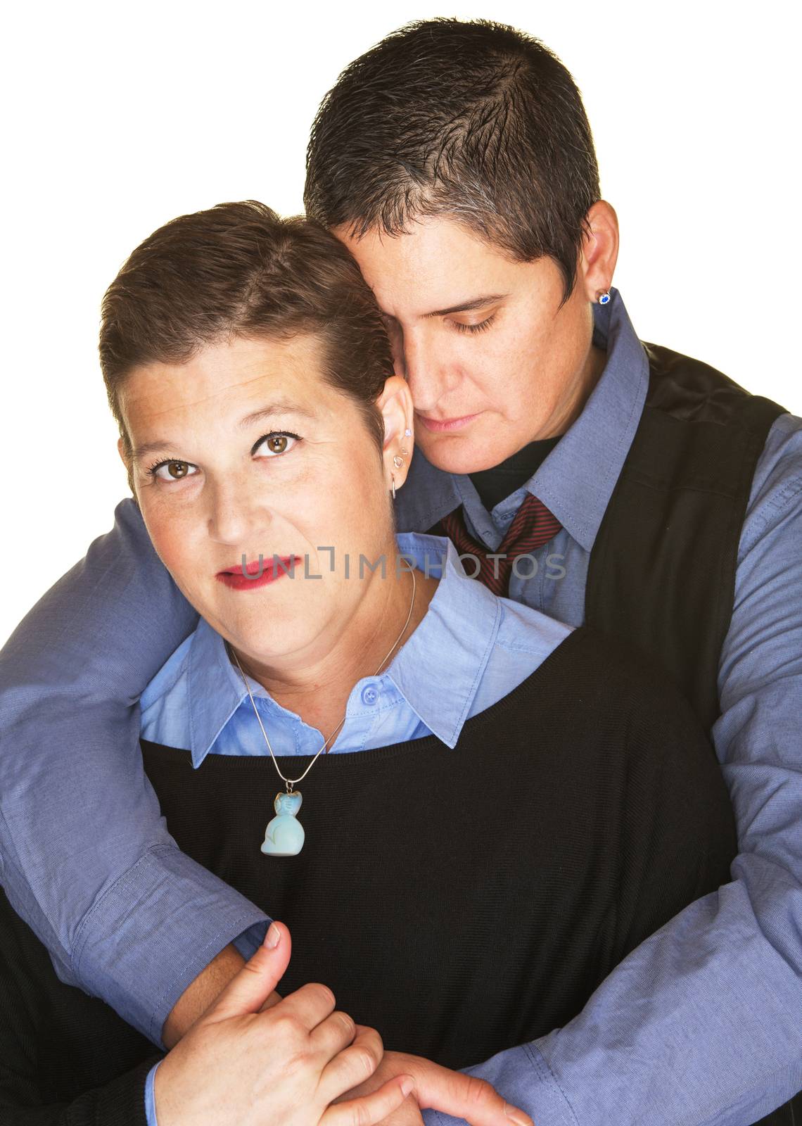 Calm lesbian couple over isolated background holding each other