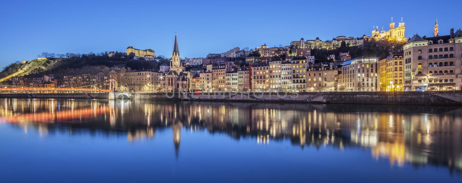 Panoramic view of Lyon with Saone river by night, France.