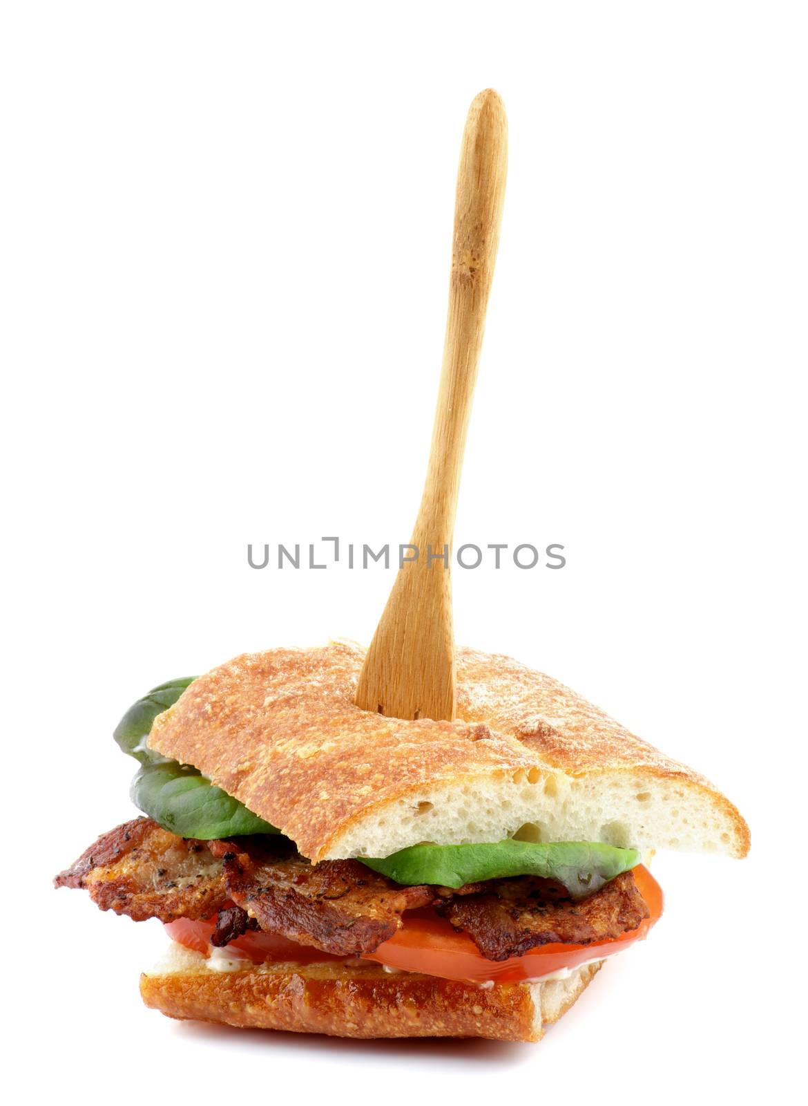 Ciabatta Sandwich with Bacon, Tomato, Lettuce and Sauces with Wooden Fork isolated on white background