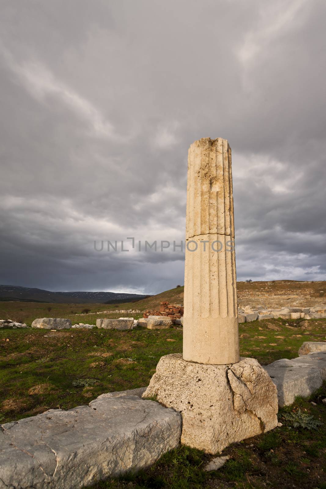 Remains of Ionic column near ampitheater at Antioch Pisidian in Turkey